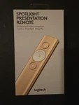 Logitech Spotlight Wireless Presentation Remote - Gold Open. Price: $75.00.